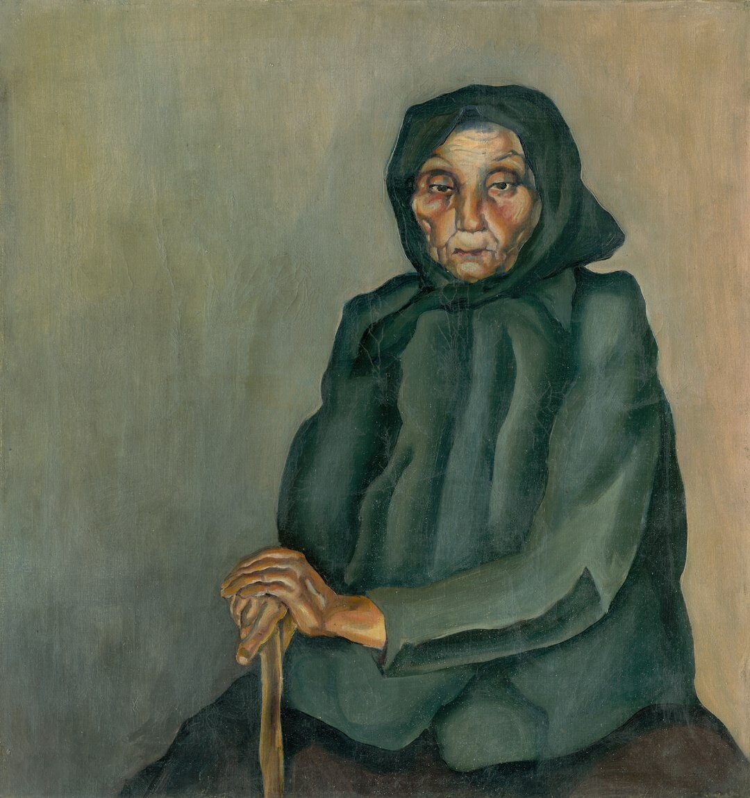 Portrait of a smiling senior Croatian woman with short grey hair