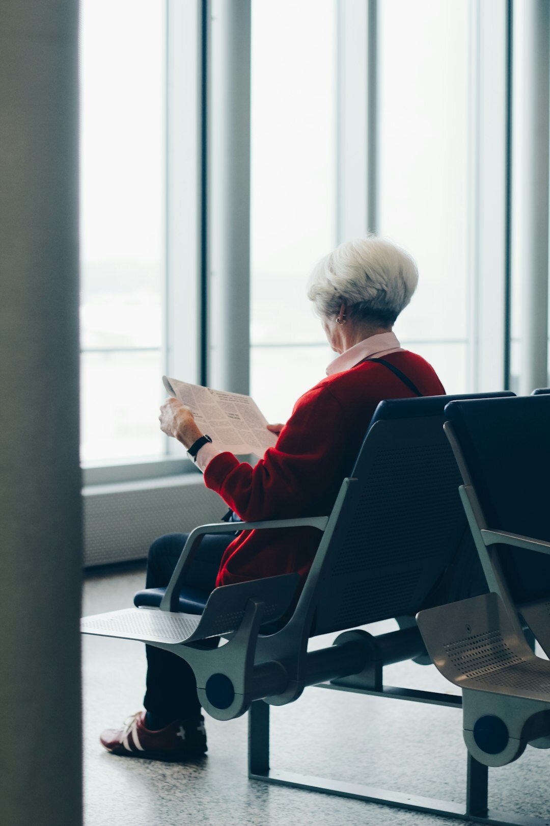 elderly woman using tablet