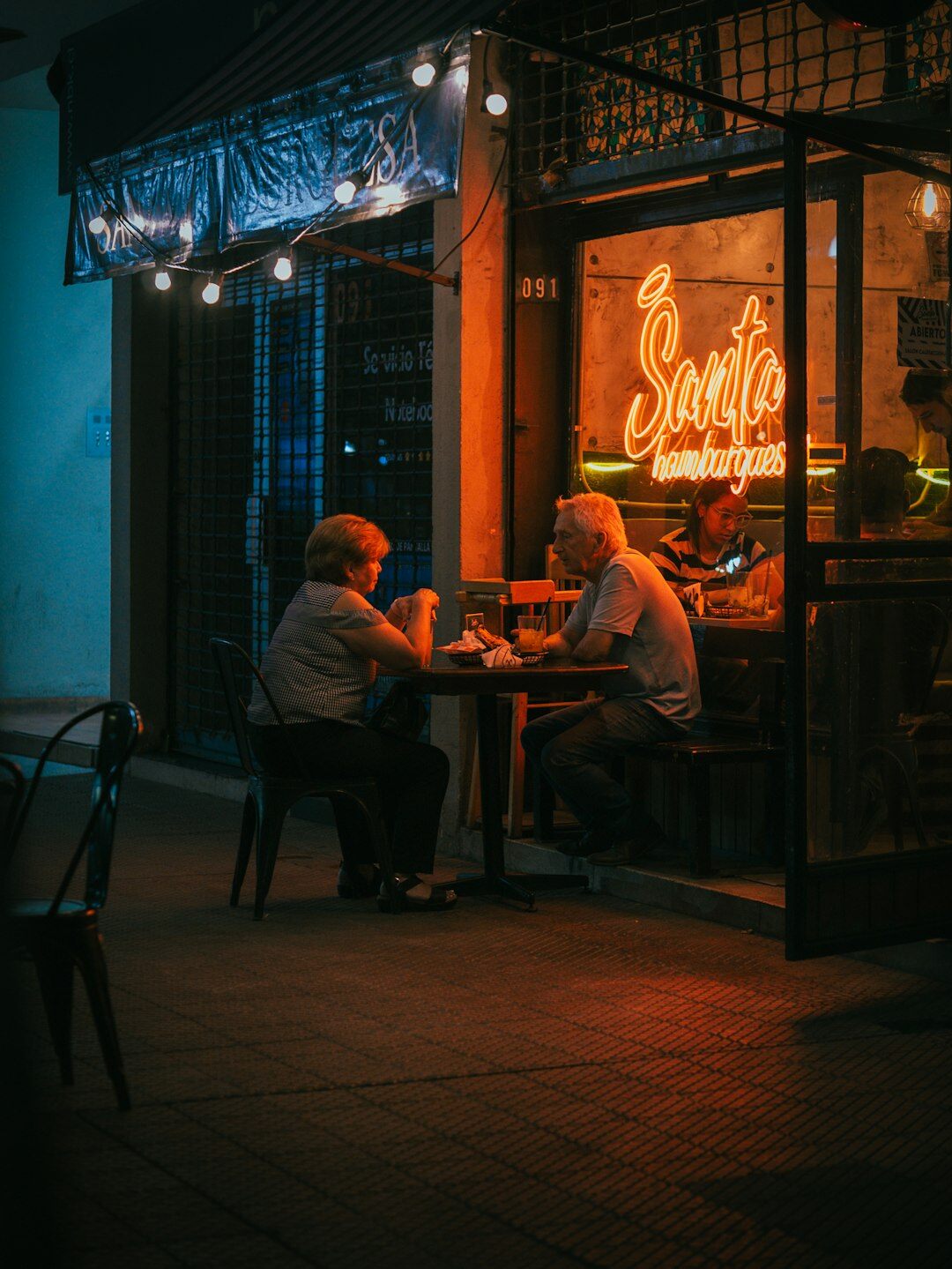 Seniors enjoying coffee and conversation at a social gathering